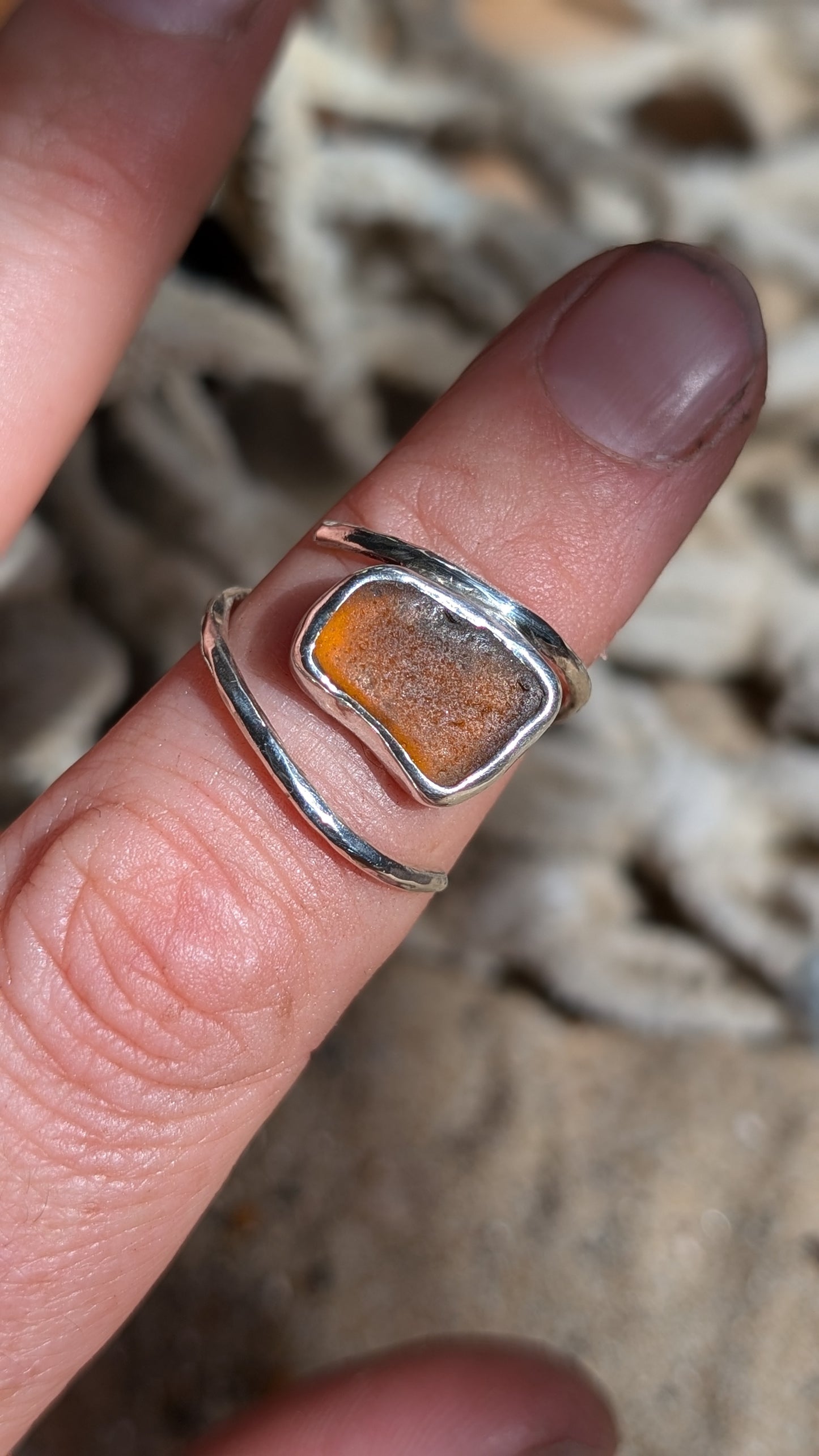 Adjustable brown sea glass ring with lightly hammered round band