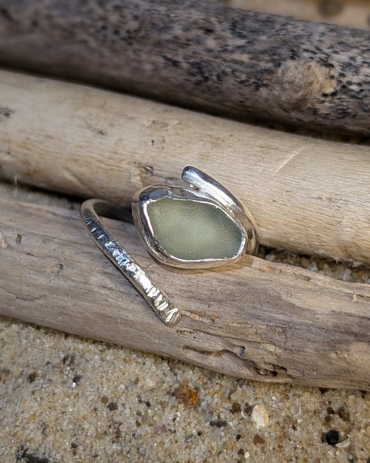 Adjustable sea foam sea glass ring with half hammered round band